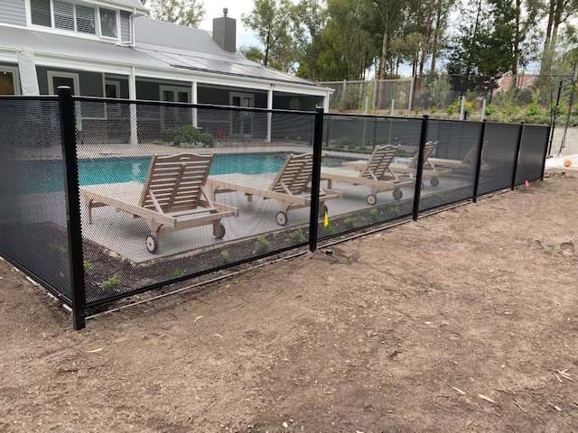 Pool perf and glass under pergola