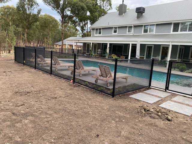 Pool perf and glass under pergola Perfect combination style fencing to compliment the surrounds