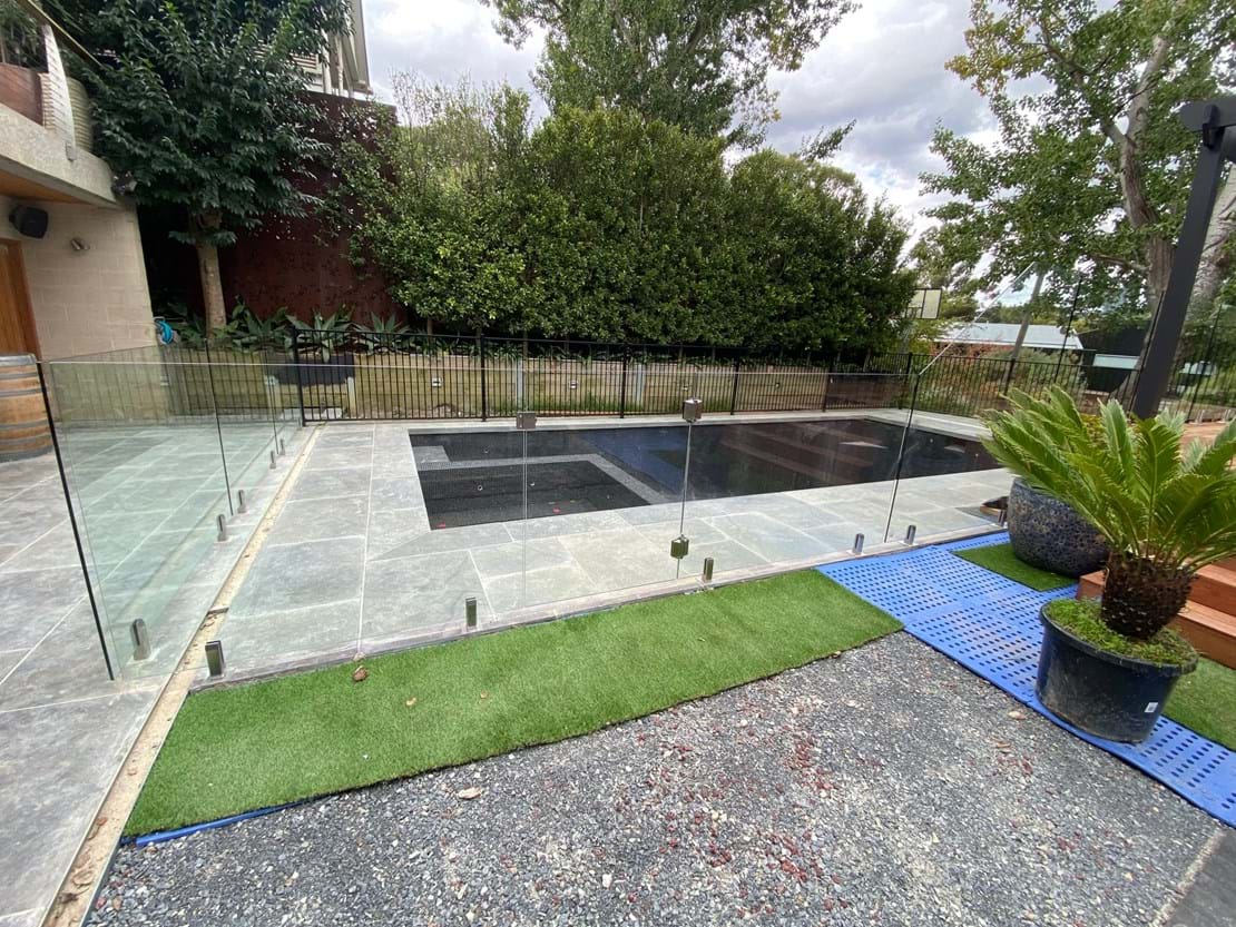 Fence install for Jim in Surrey Hills Combination Fence, Frameless and aliminium. Custom glass rake panel Custom Aluminium rake panel