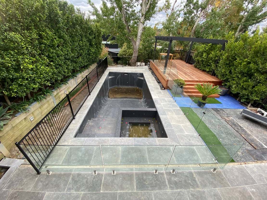 Fence install for Jim in Surrey Hills Combination Fence, Frameless and aliminium. Custom glass rake panel Custom Aluminium rake panel