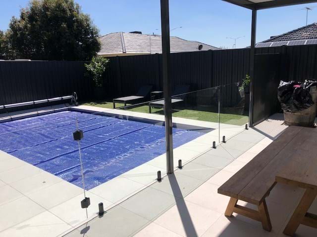 Frameless Glass Fence with Black Spigots